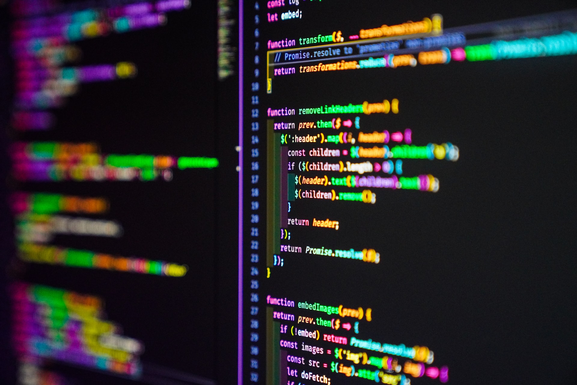 Colorful JavaScript code on the monitor screen